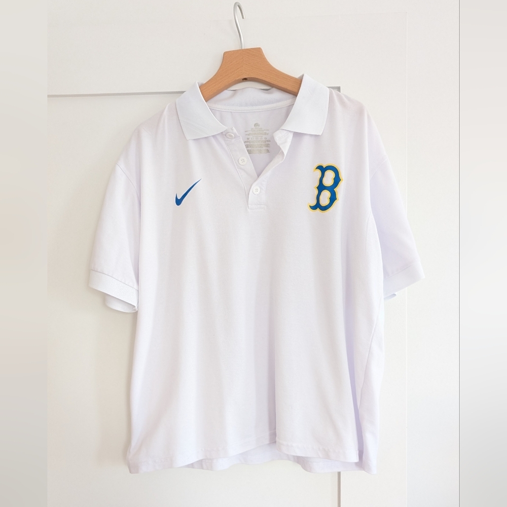 Nike White Short Sleeve Polo Tee with Blue Logo Accent
